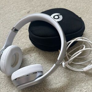 Beats by Dre White and Silver Headphones
